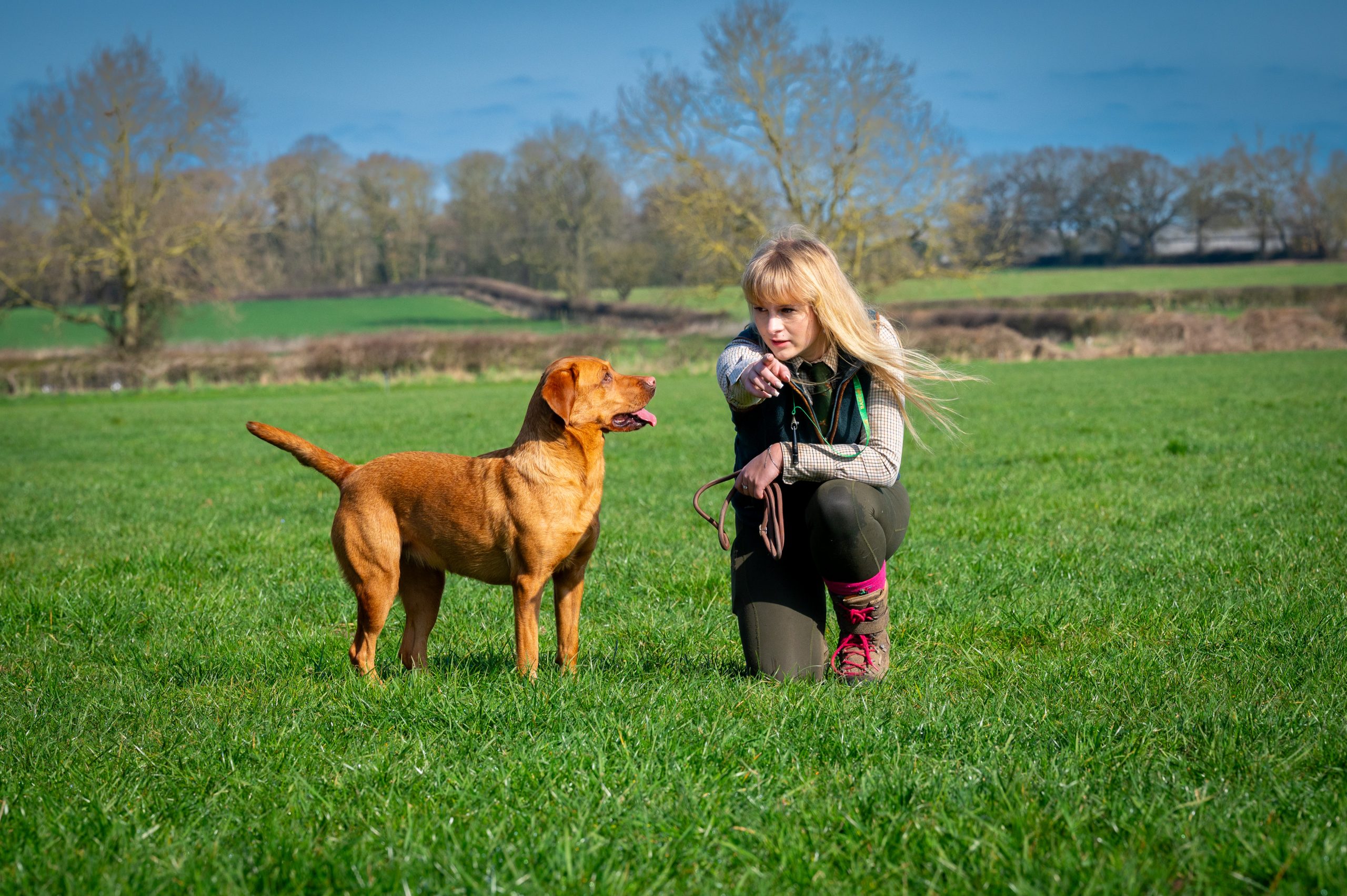 Image of Land and Wildlife student with a dog