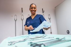 Veterinary nurse preparing operating theatre