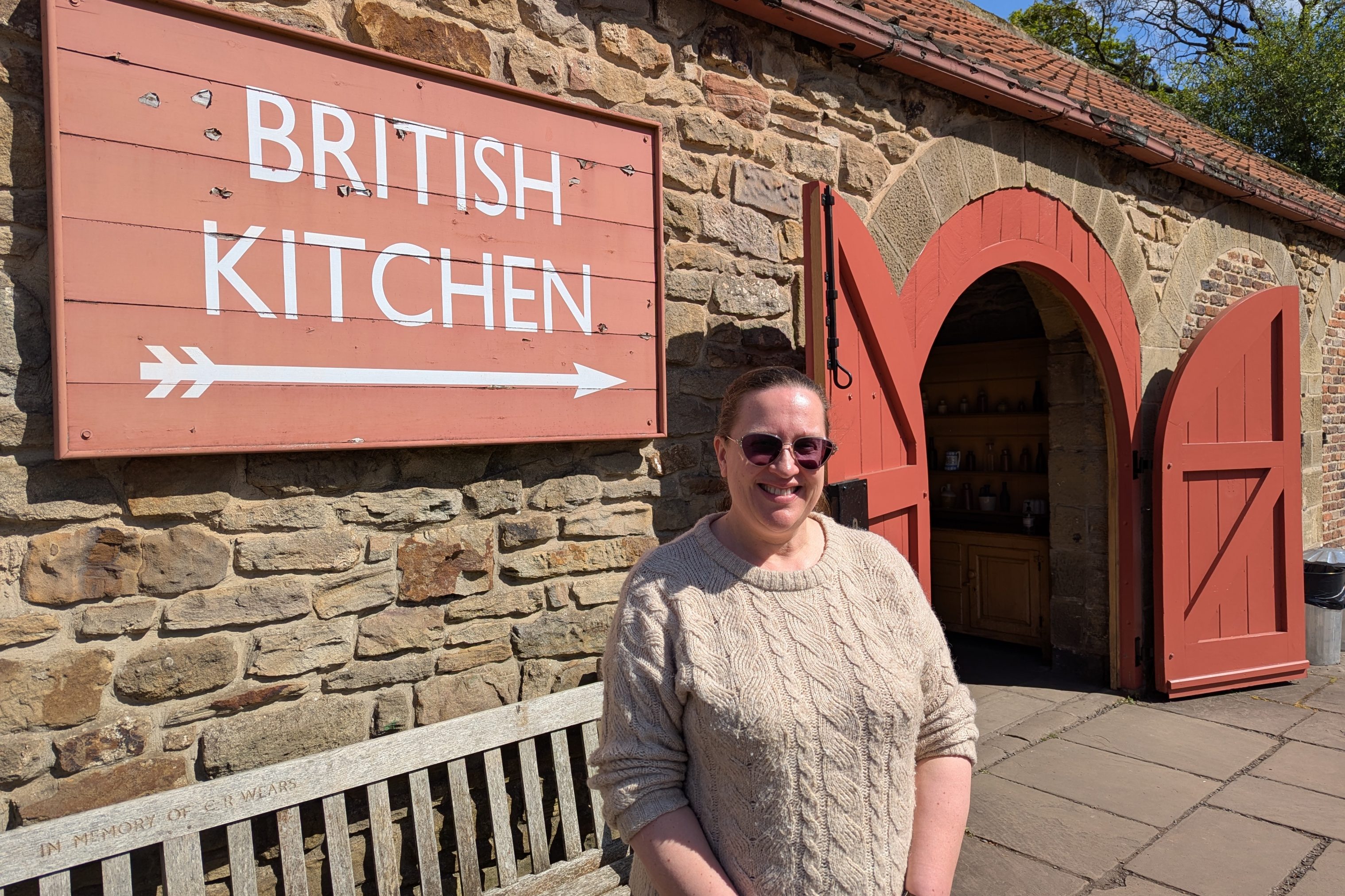 Figure stood outside British Kitchen.