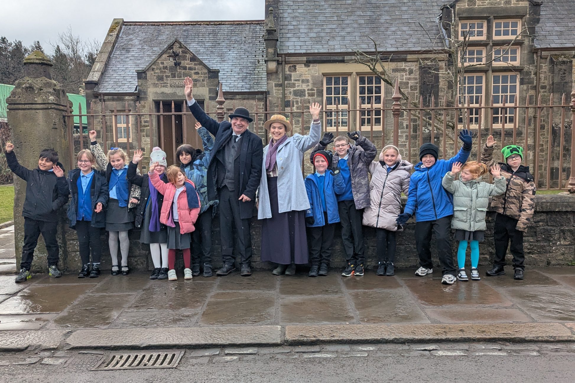 School children with costumed staff member in 1900s Pit Village.