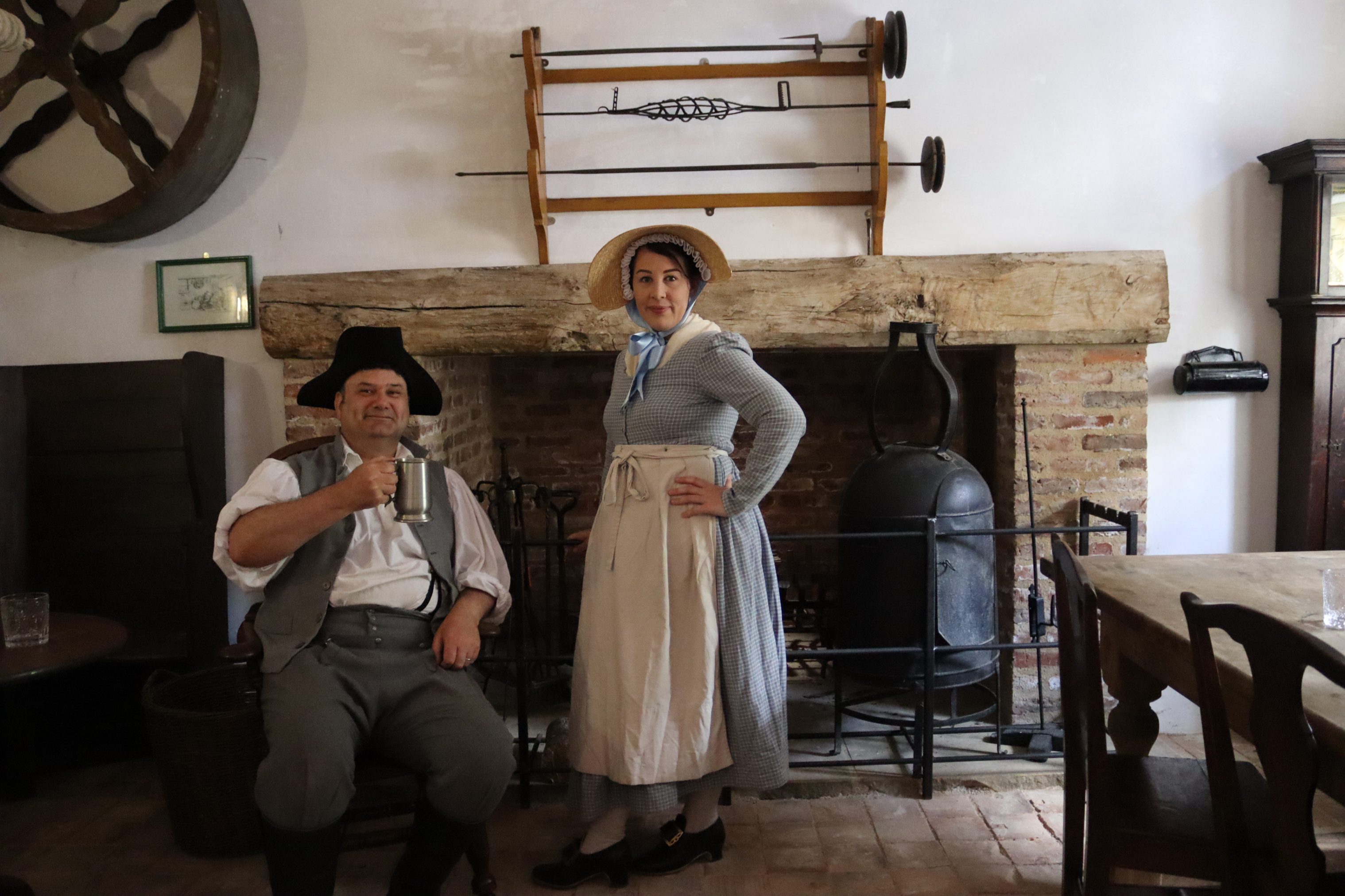 Two figures in Georgian costume.