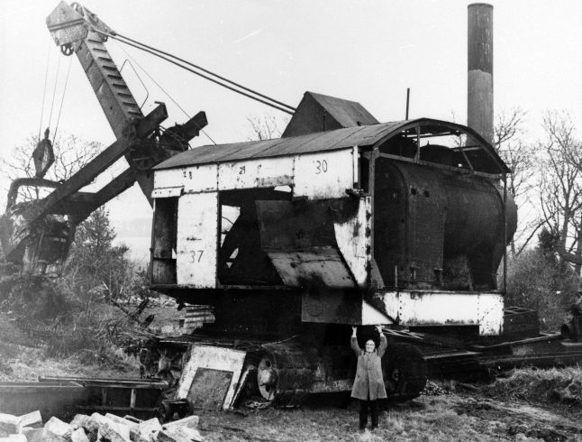 Beamish founding Director Frank Atkinson in front of the steam navvy.