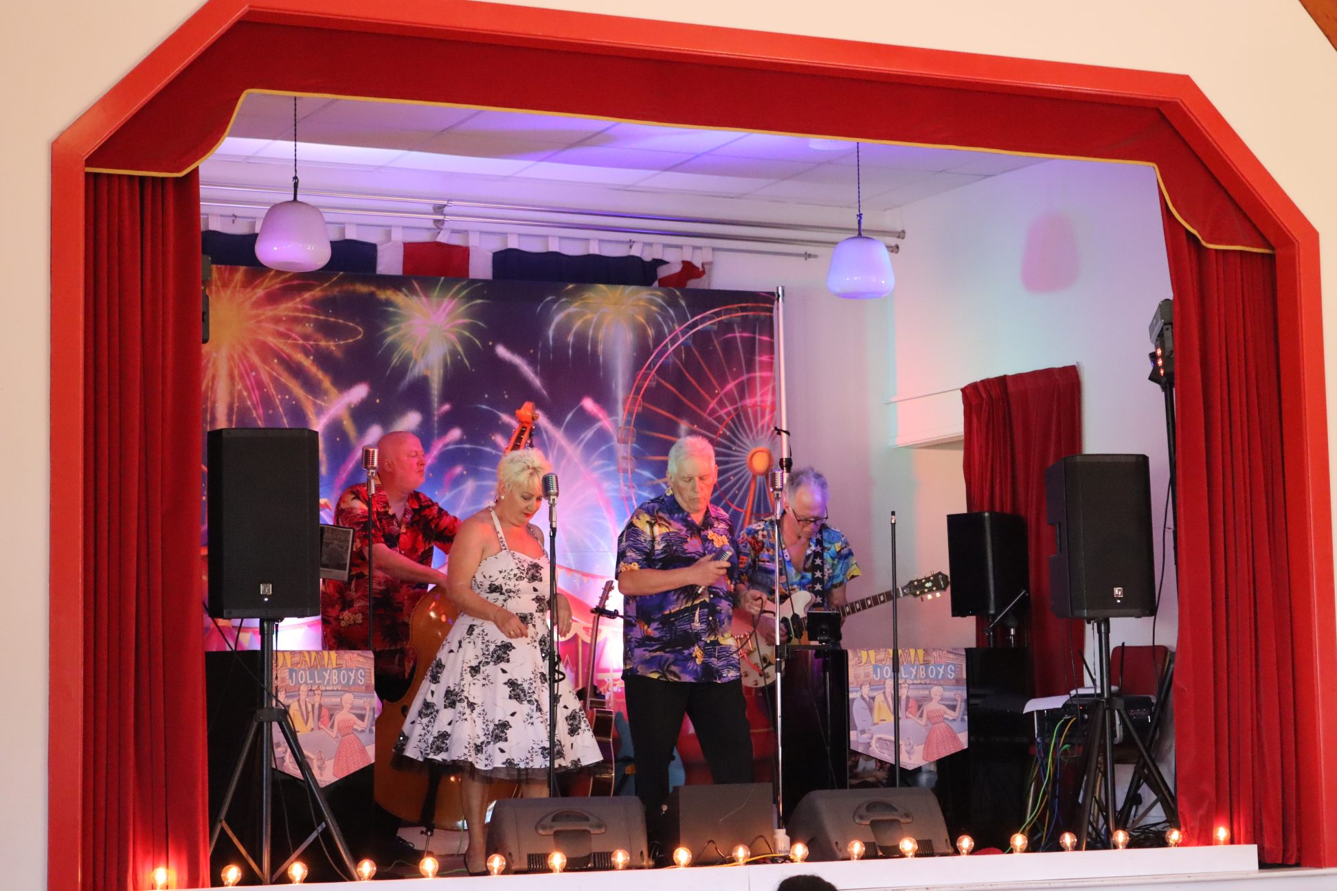 Jeanie and the Jolly Boys band performing on stage