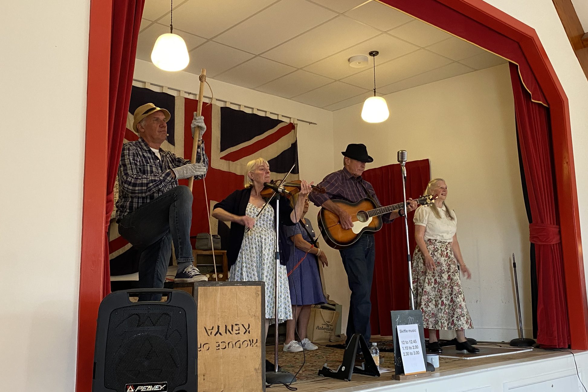 A skiffle band performing on stage