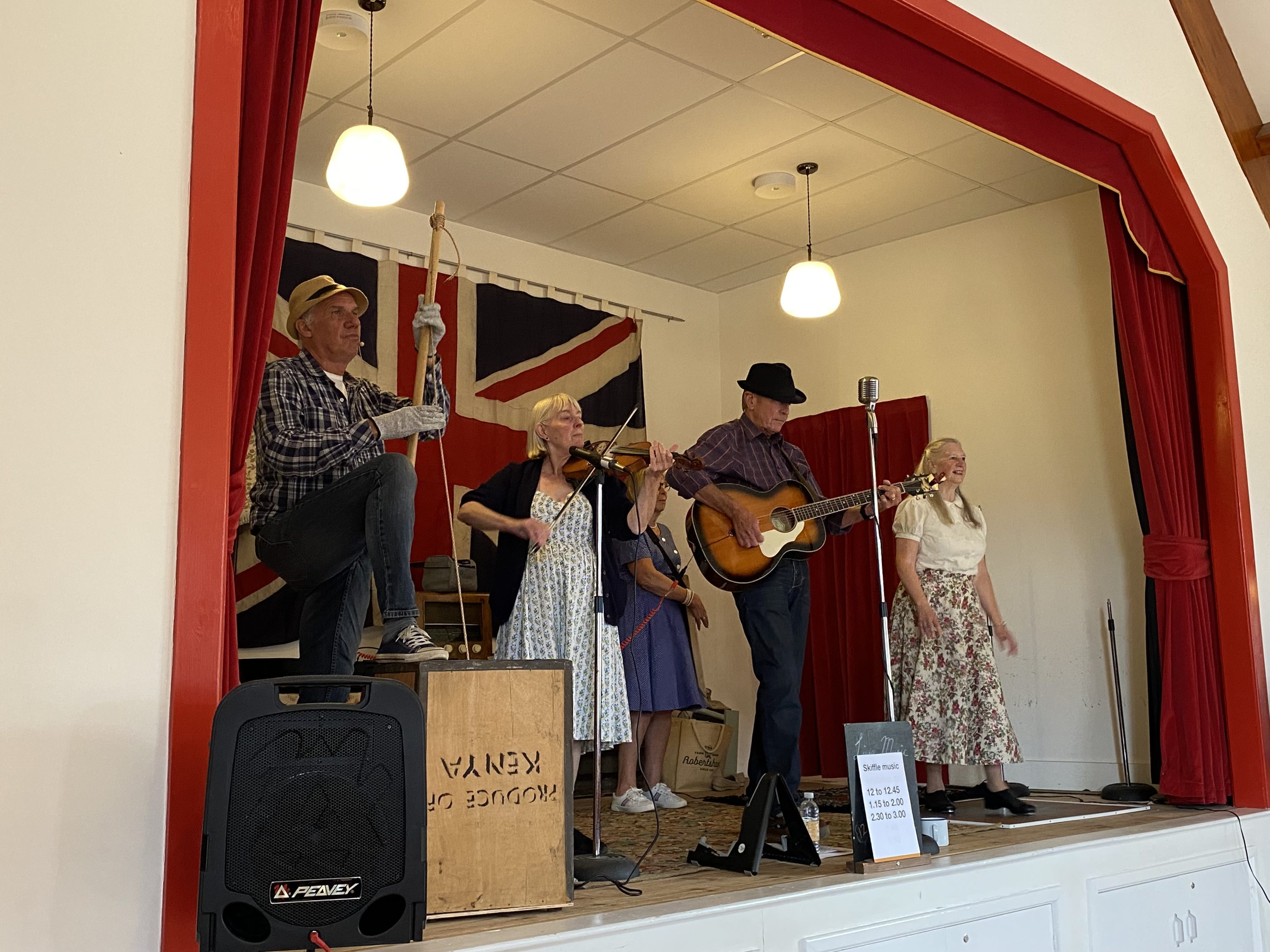 A skiffle band performing on stage