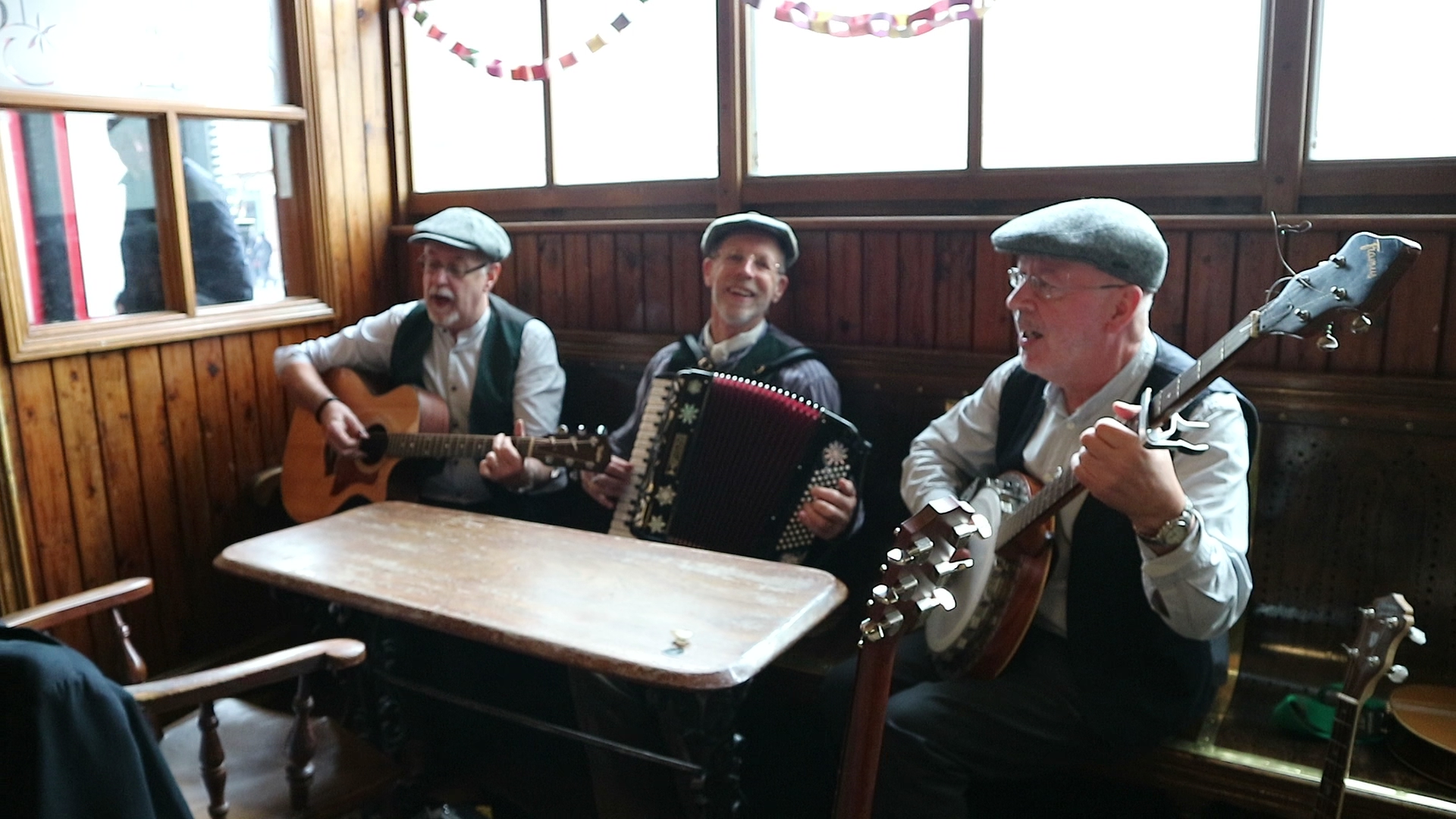 Folk band Kiddars Luck playing instruments