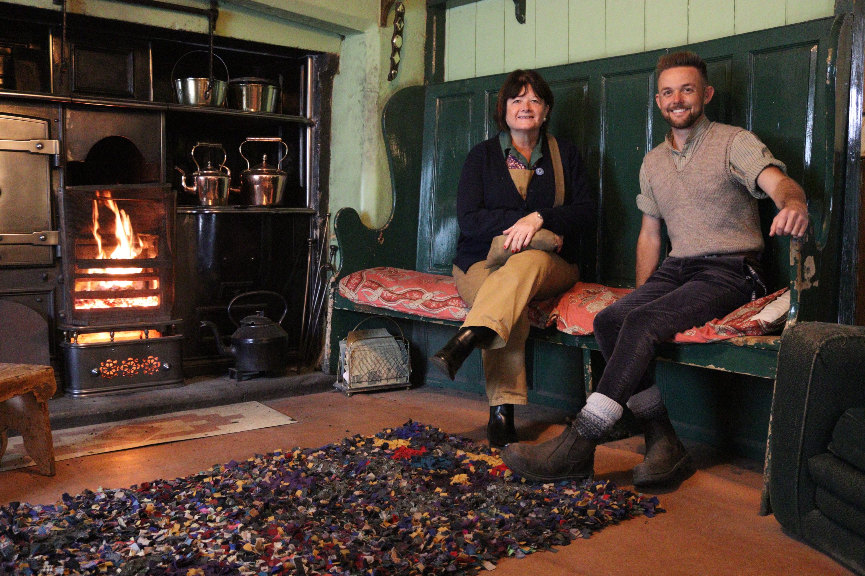 People warming by a fire