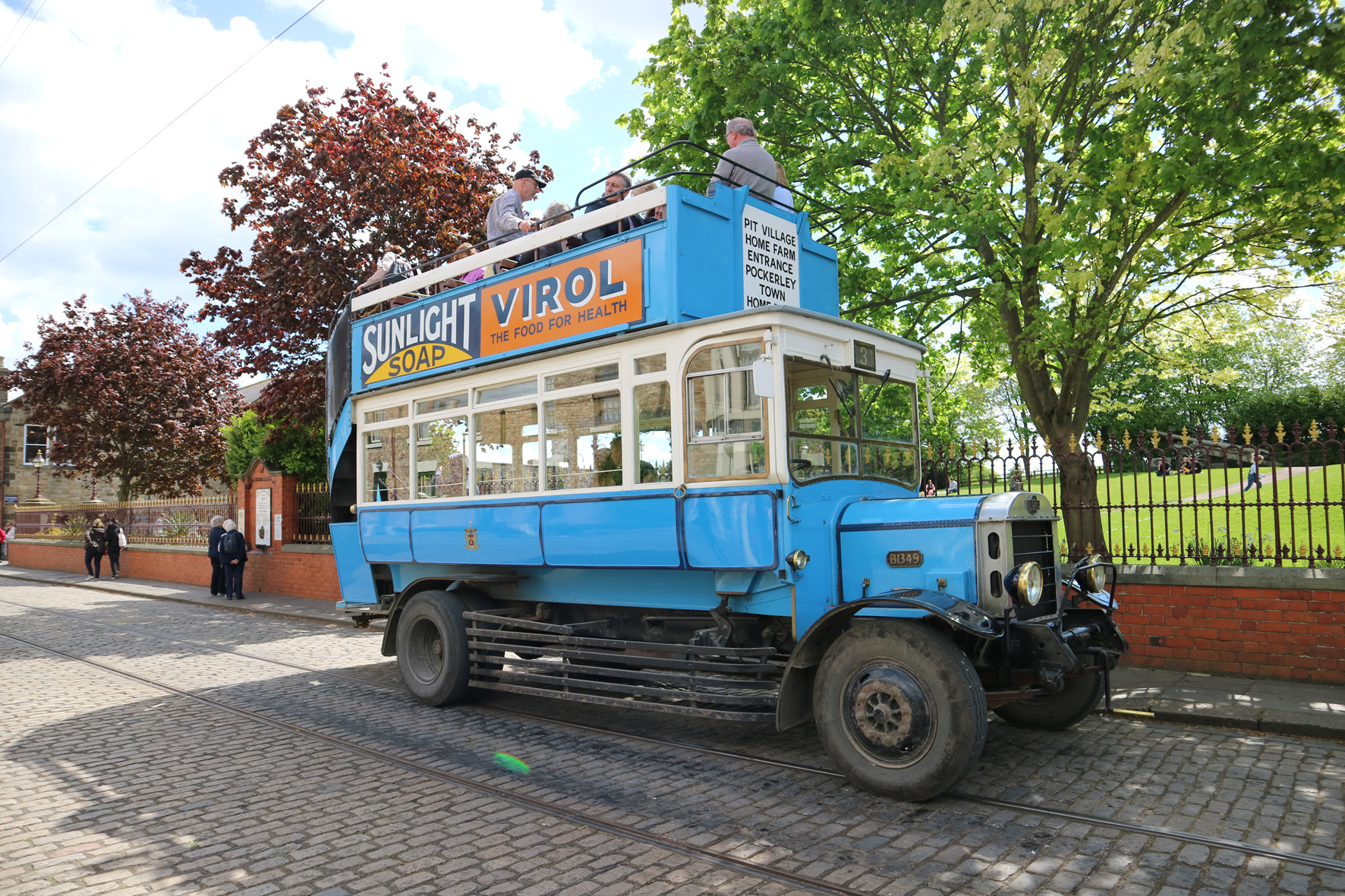 A blue vintage bus
