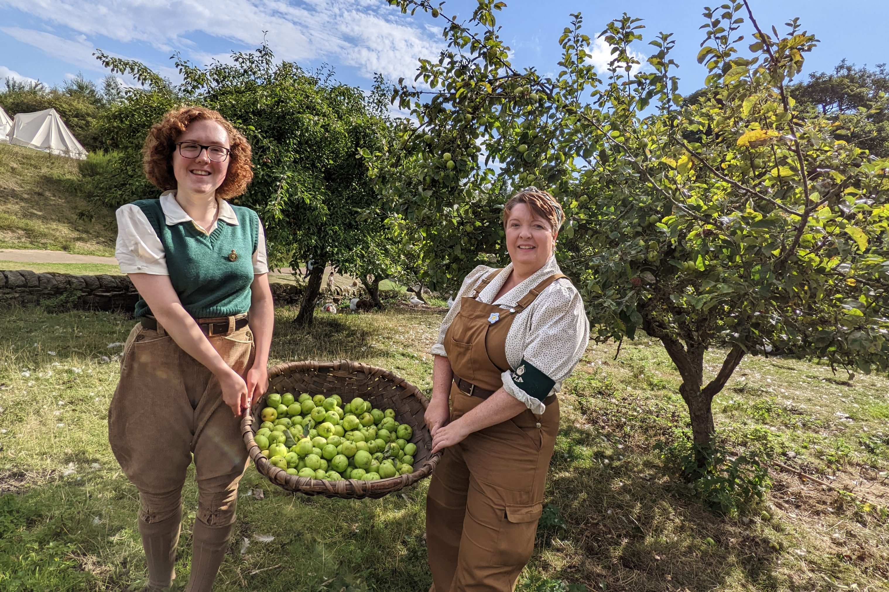 Land girls picking apples