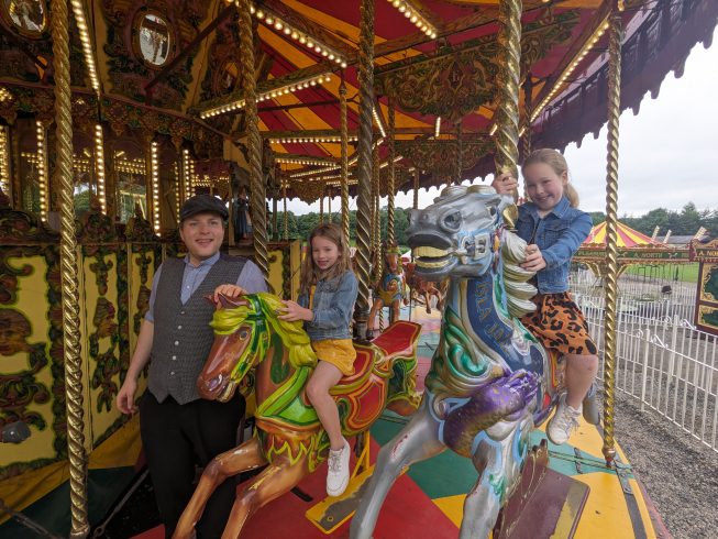 Riding a carousel horse