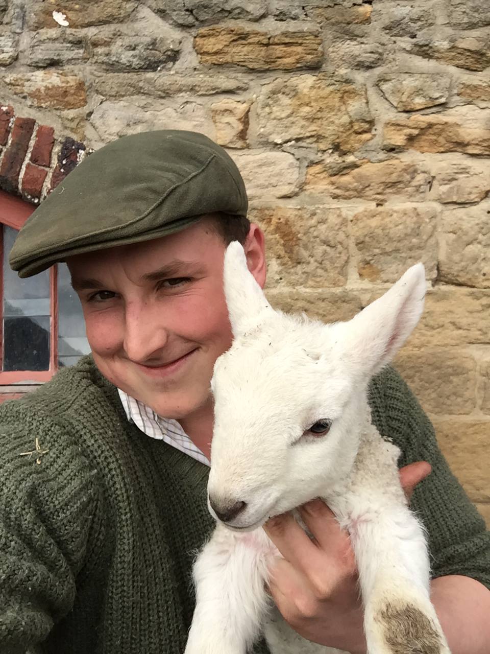 Taking a selfie with a lamb
