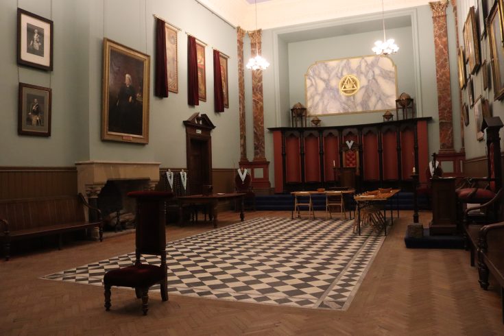 Double cube room with chequerboard floor.
