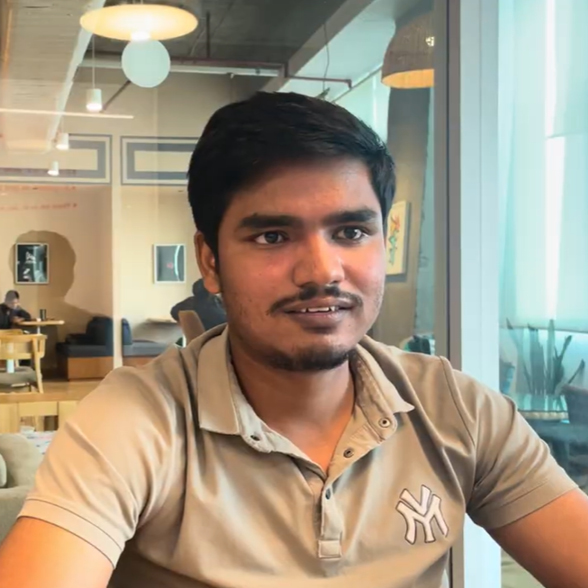 Ashutosh a graduate Revit/CAD graduate sat at his desk in the Noida office in India.