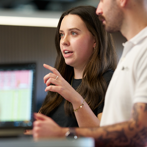 Abby Broadbent a graduate mechanical engineer engaed in a meeting with another engineer,
