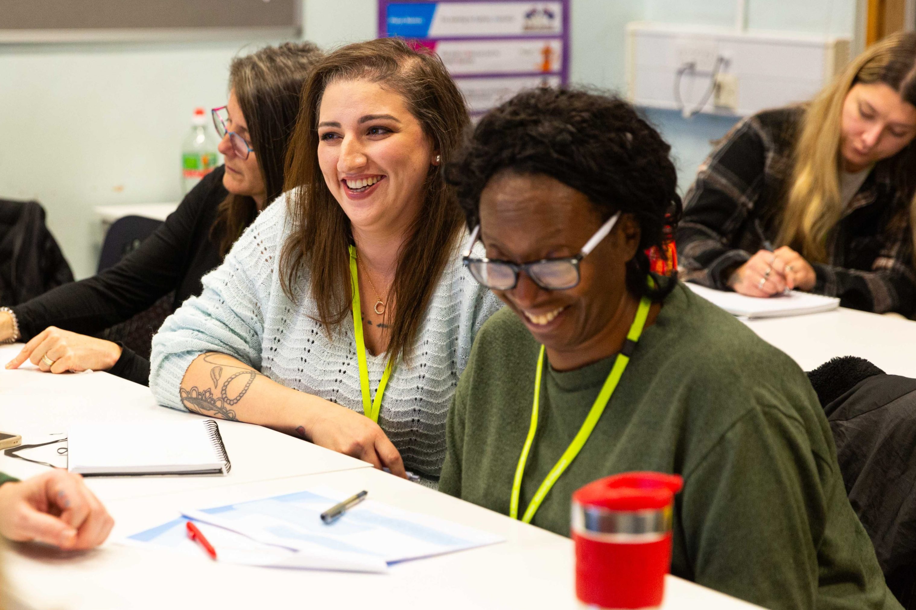 Student laughing in classroom
