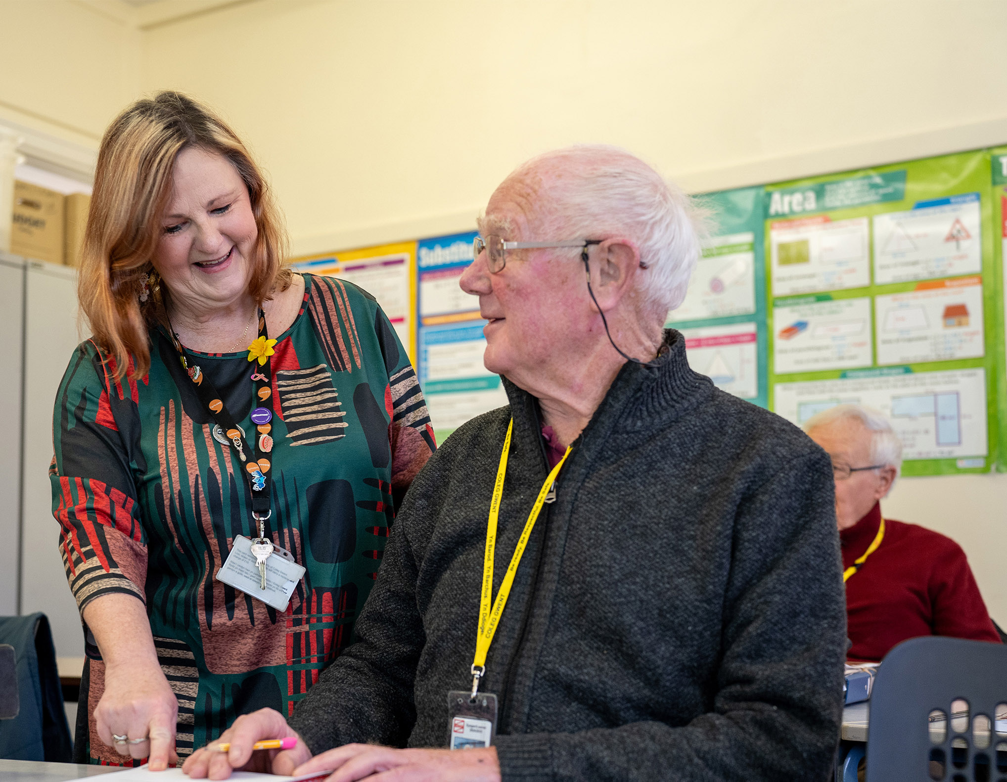 Adult learner talking to tutor