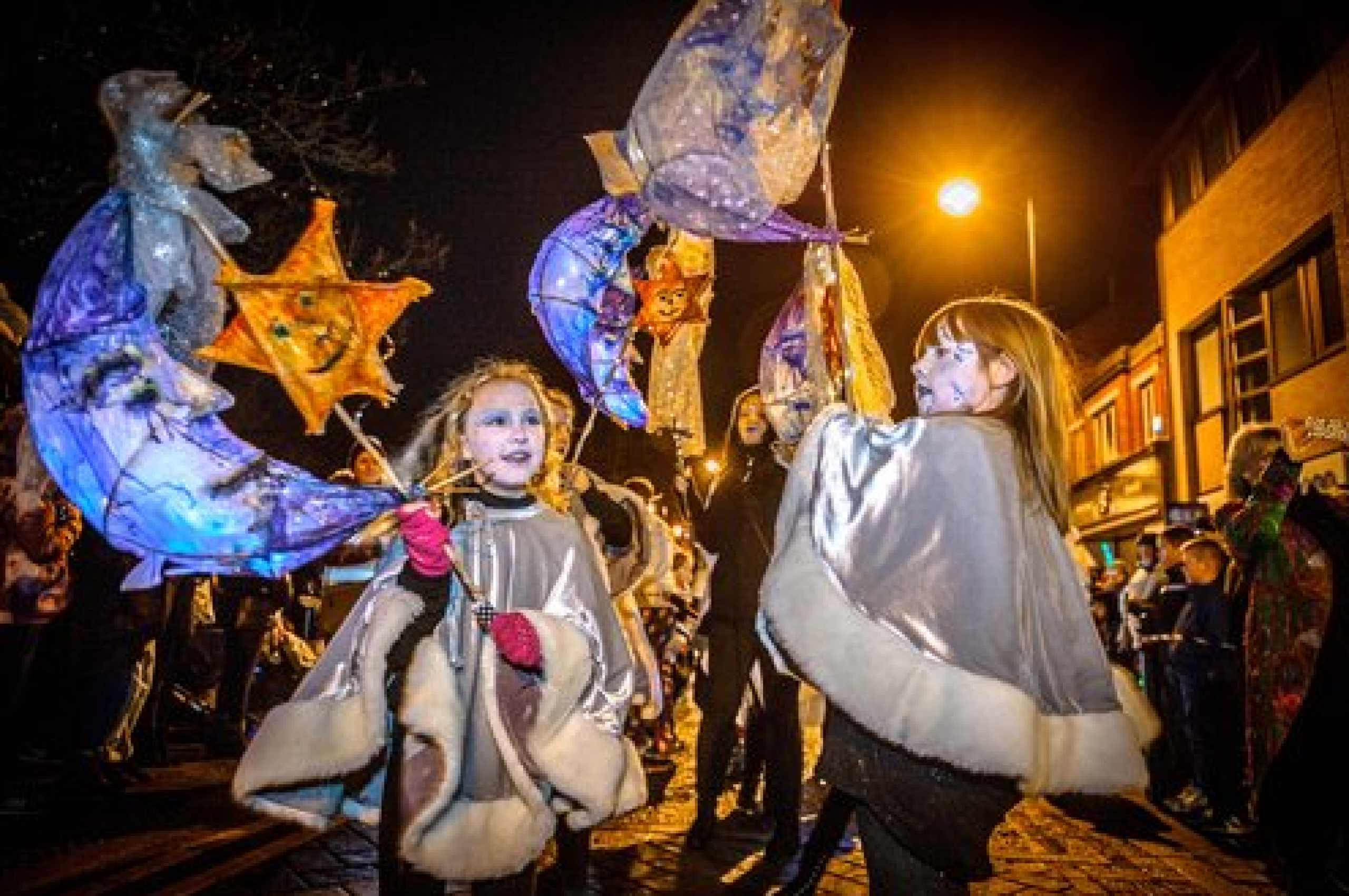 Children carrying lanterns at the Crook Winter Light Parade