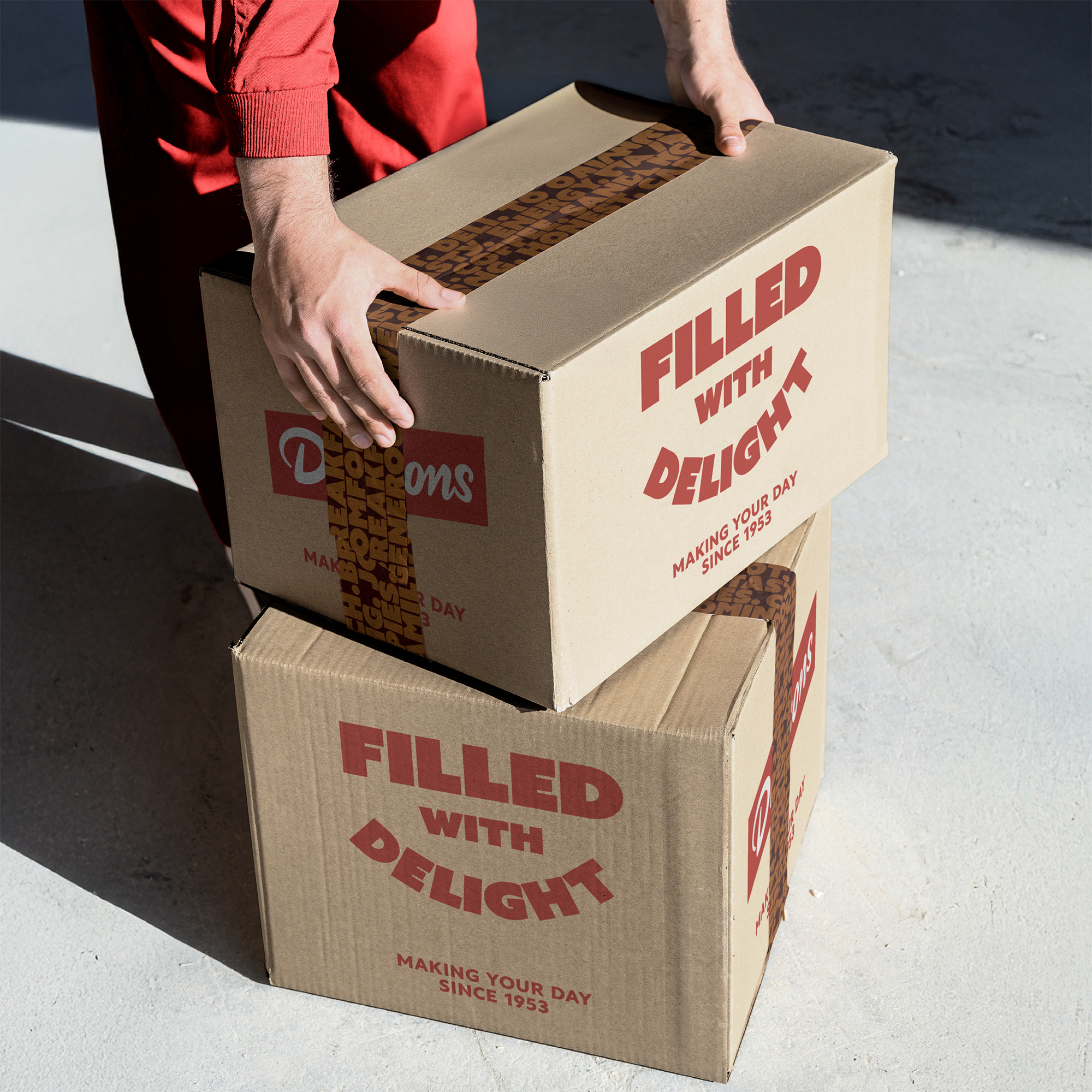 Person picks up cardboard boxes.