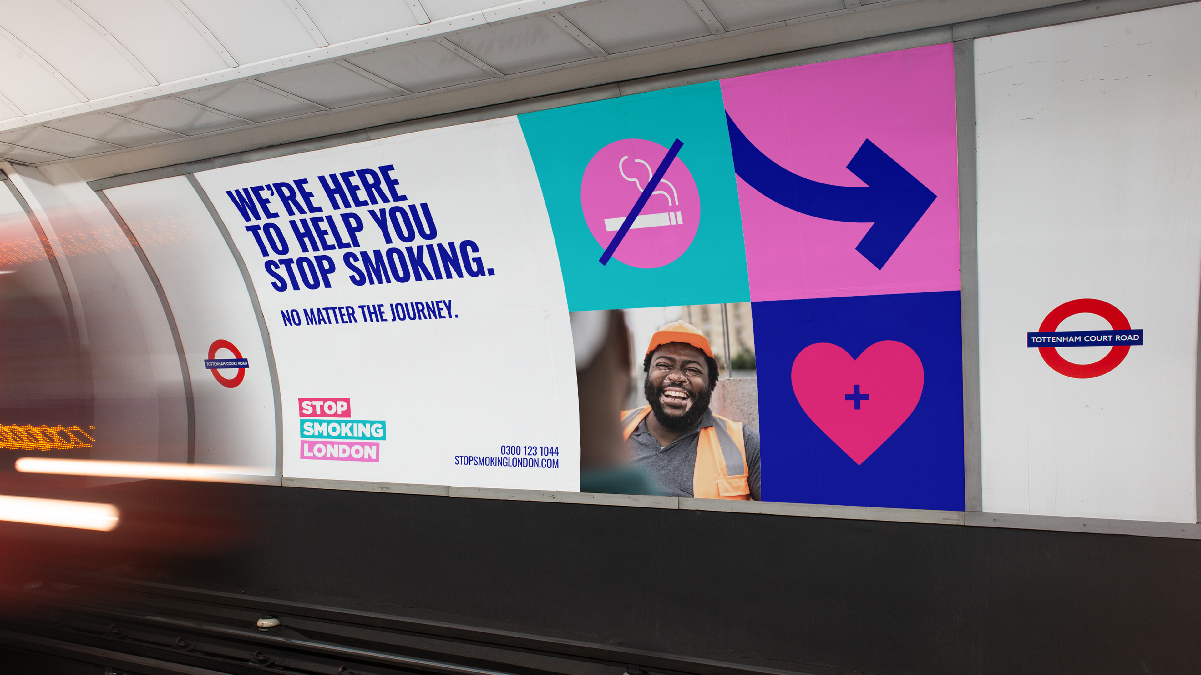 Advertising boarding at Tottenham Court Road Tube Station in London.