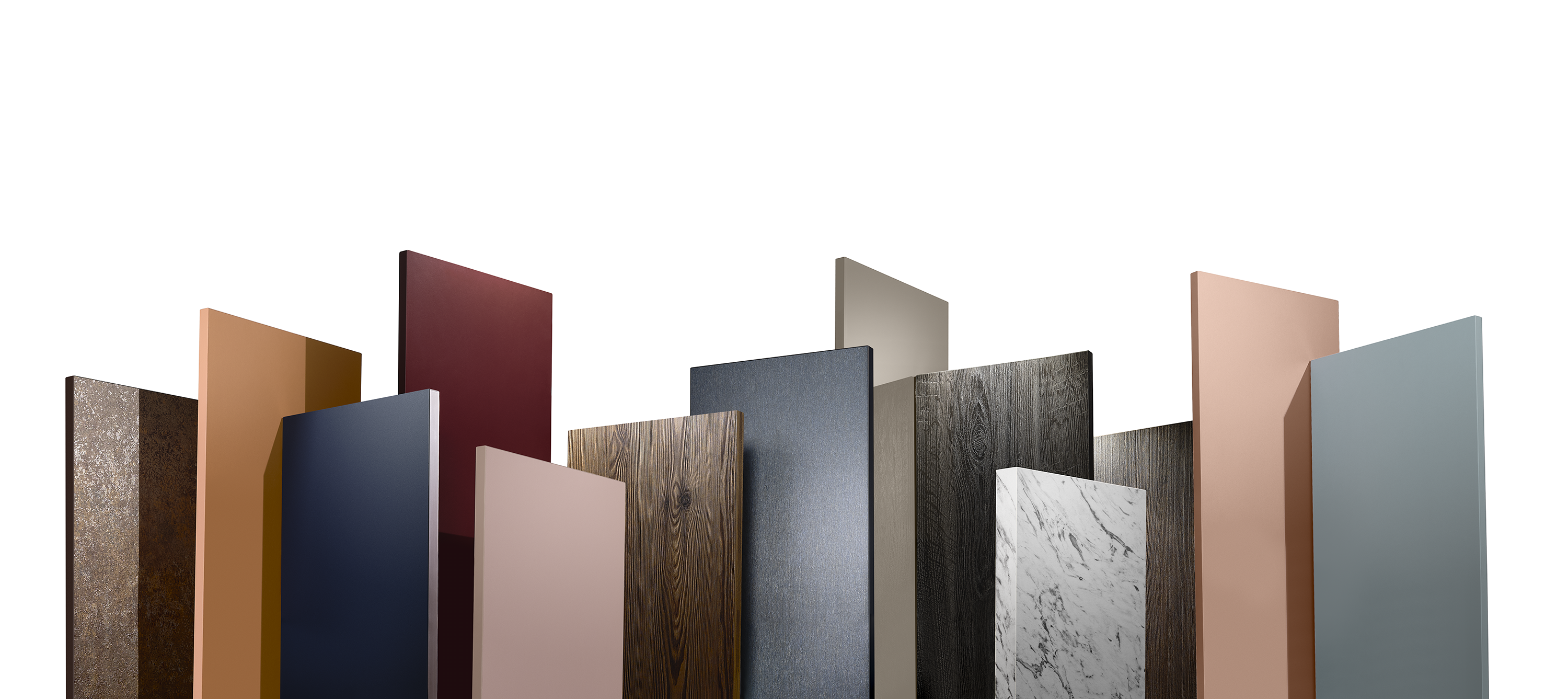 Different textured boards stand upright against white backdrop.