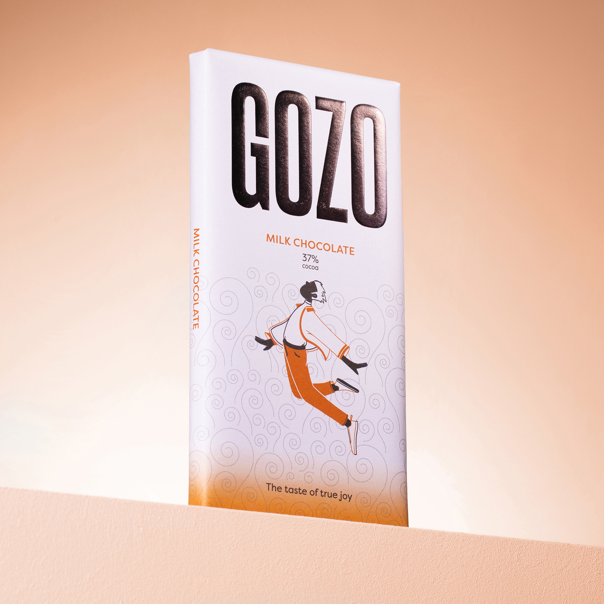 A chocolate bar with orange packaging