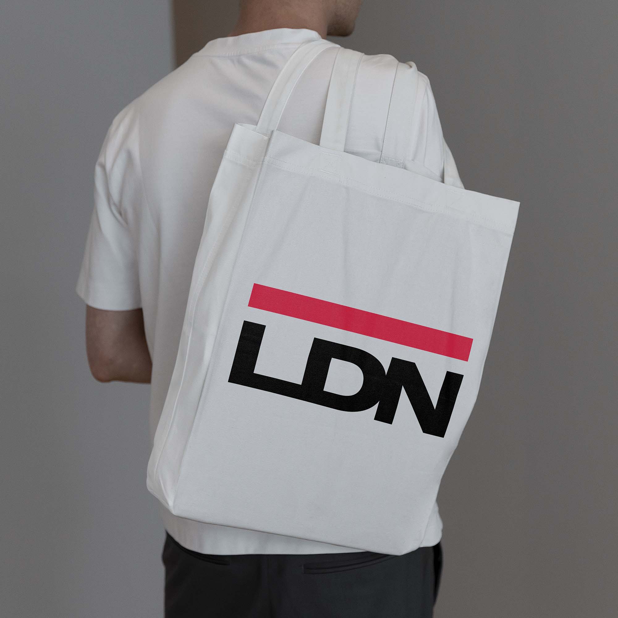 White tote bag over shoulder