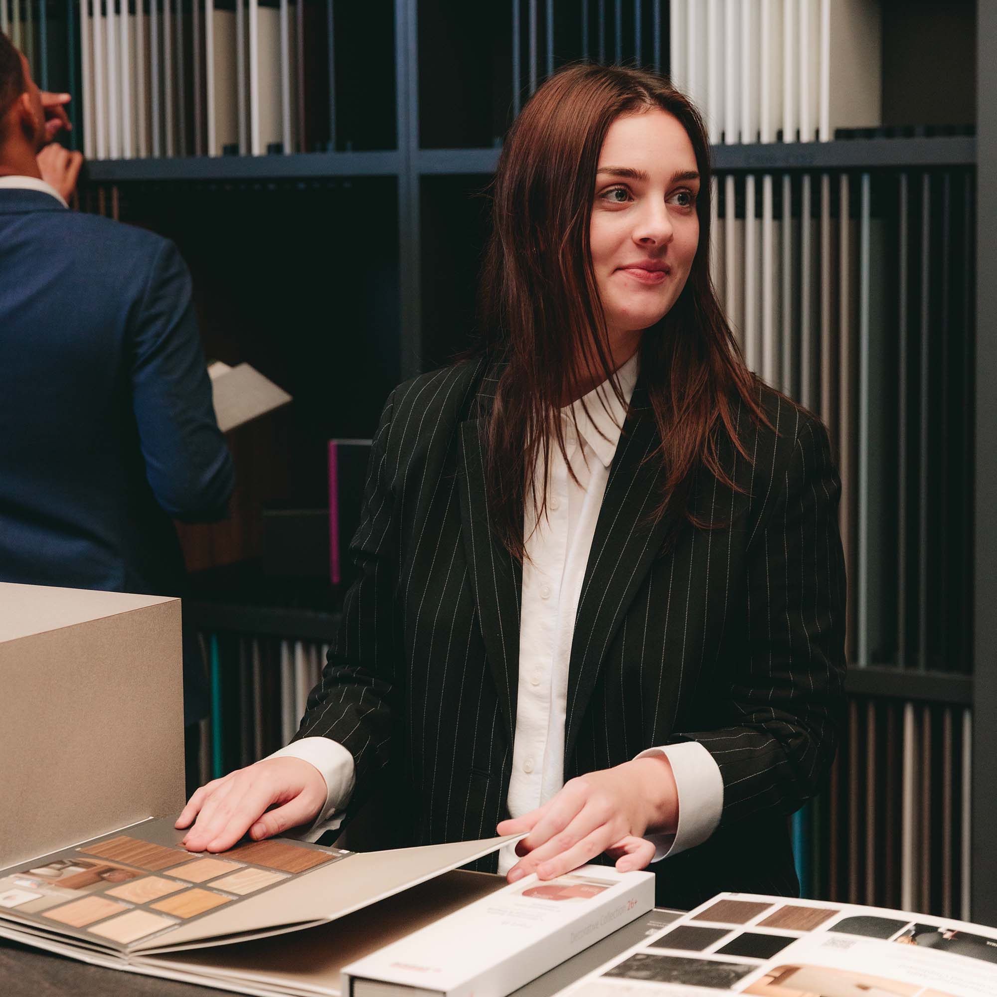 Female designer selecting material finishes