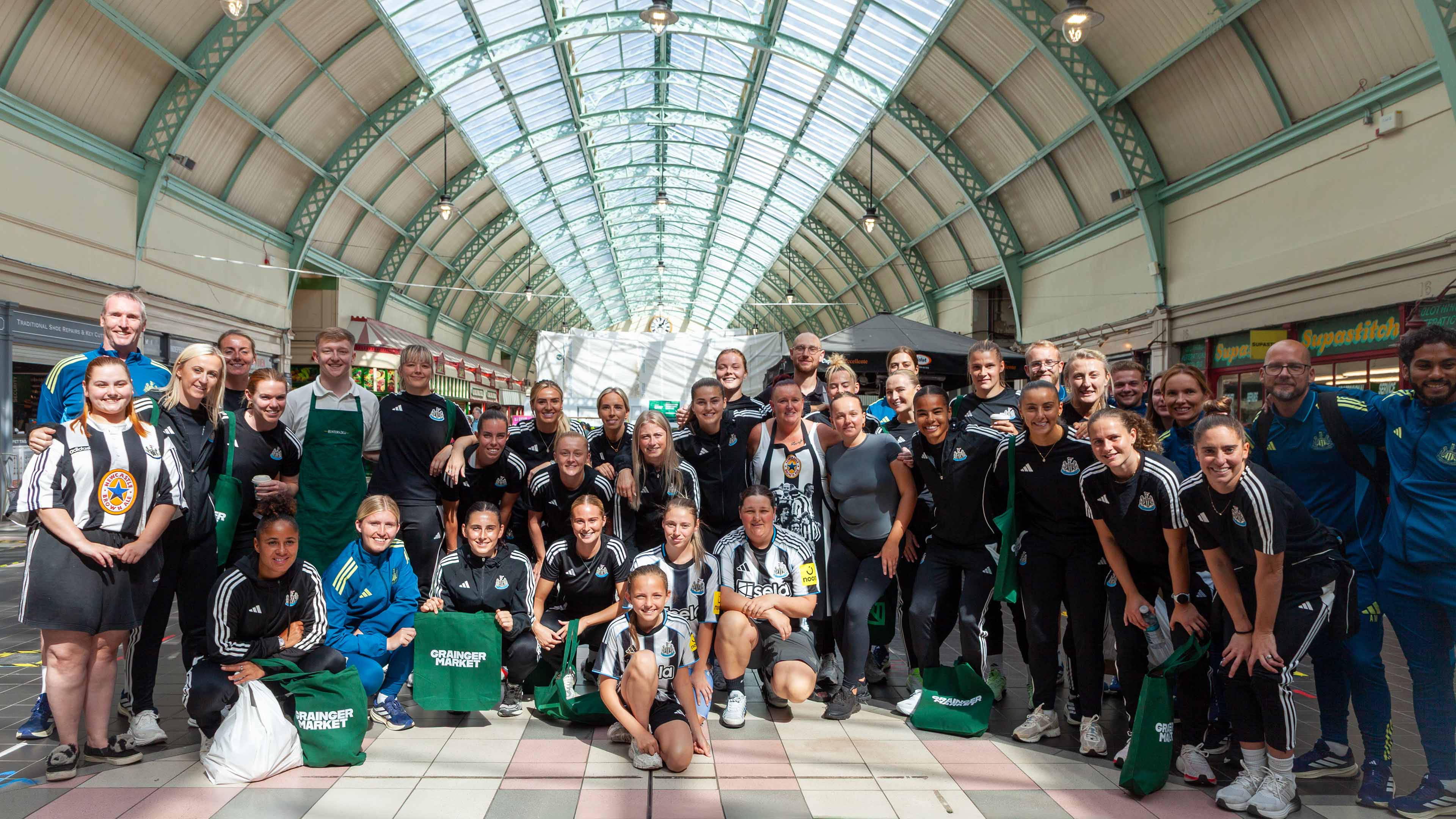 Newcastle United Women's team inside Grainger Market