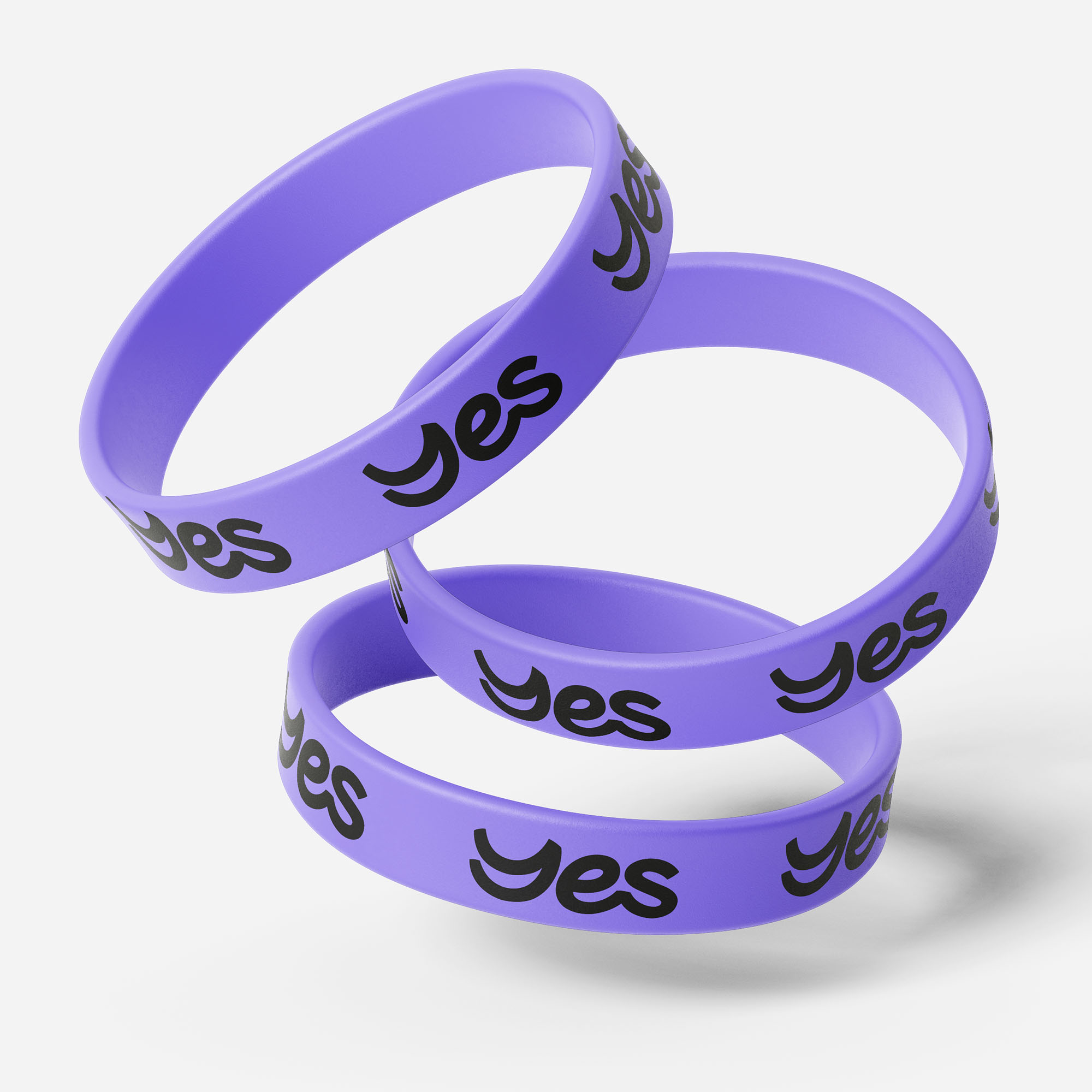 Three purple branded wrist bands on light grey background.