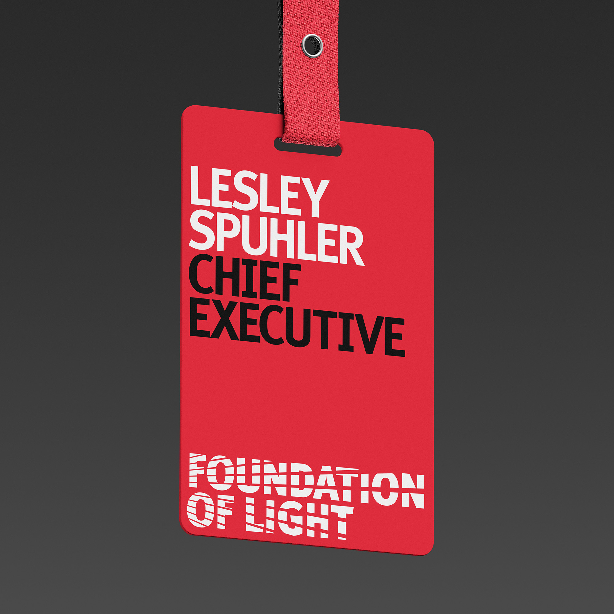 Red Foundation of Light lanyard design against a grey background.