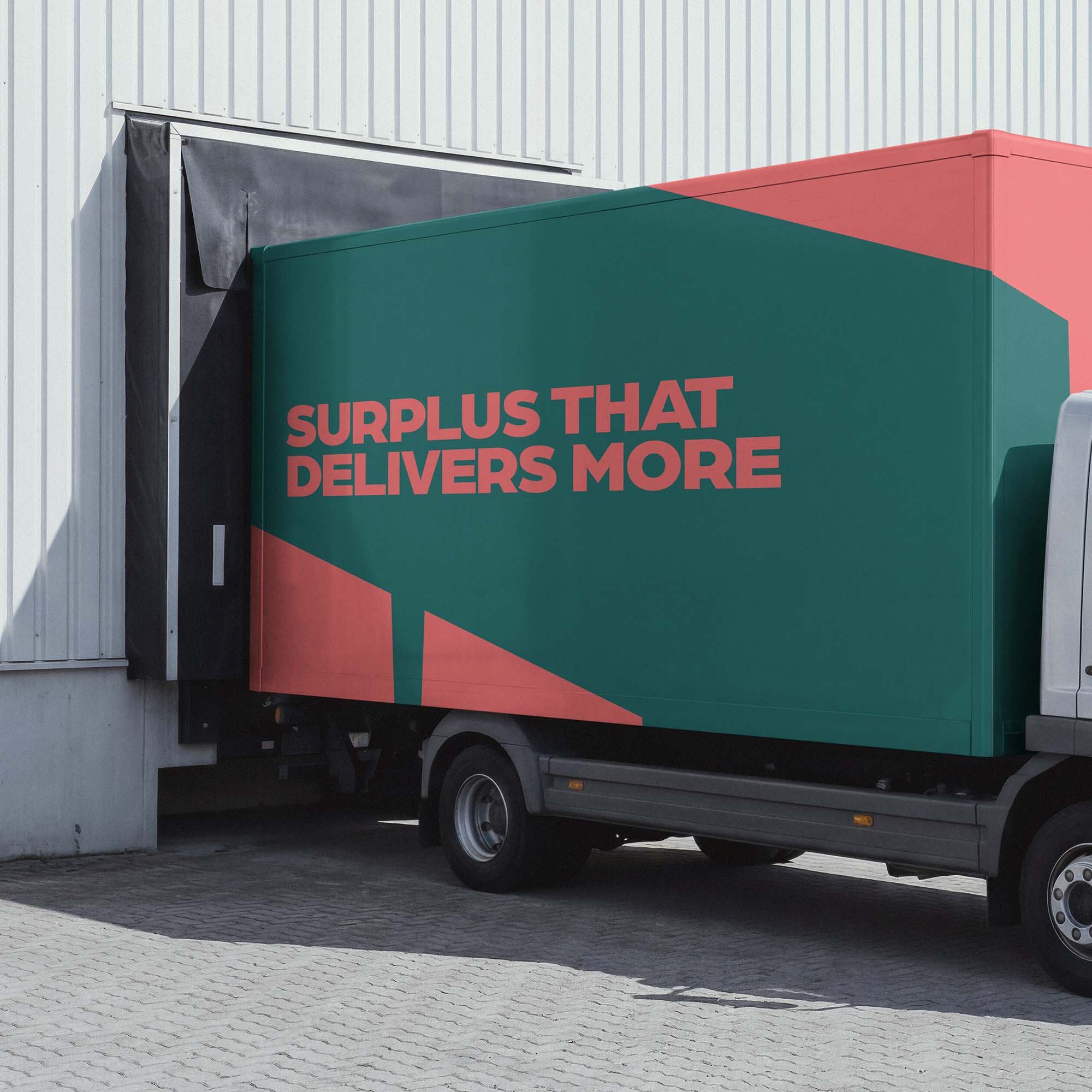 ZRO branded lorry being loaded at a depot with a powerful message on the side 'Surplus that delivers more'