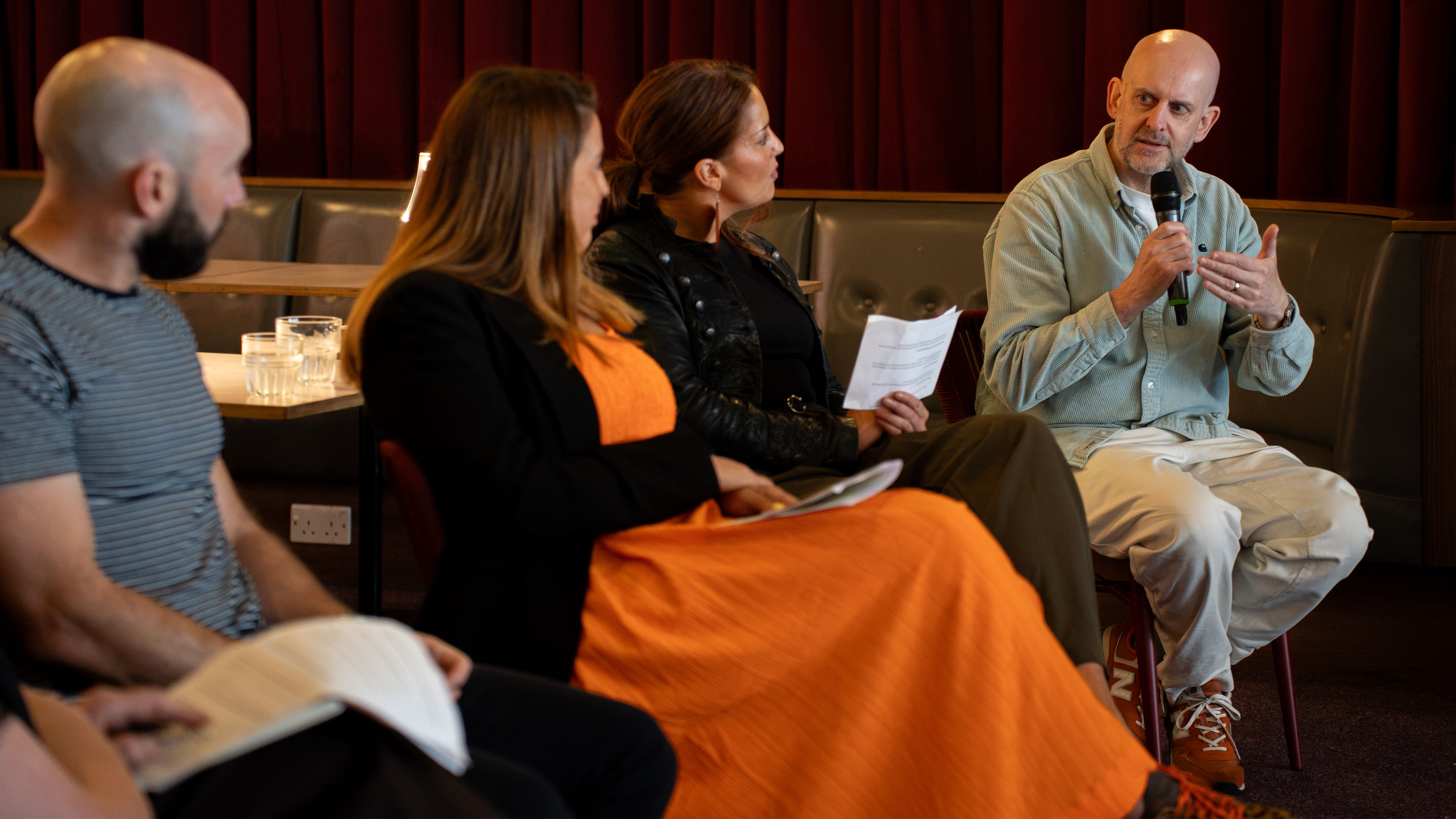 People engaged in a panel discussion at the Tyneside Cinema in Newcastle Upon Tyne.