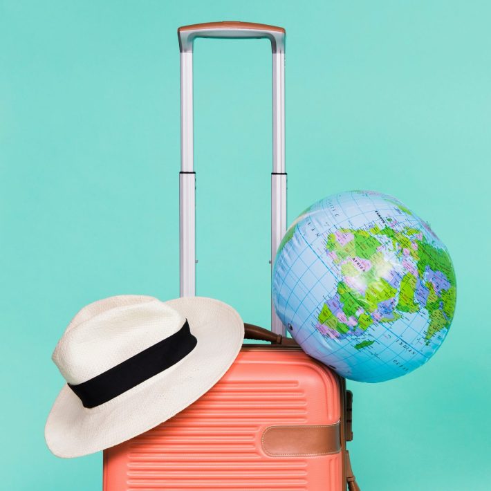 Hat, globe and suitcase