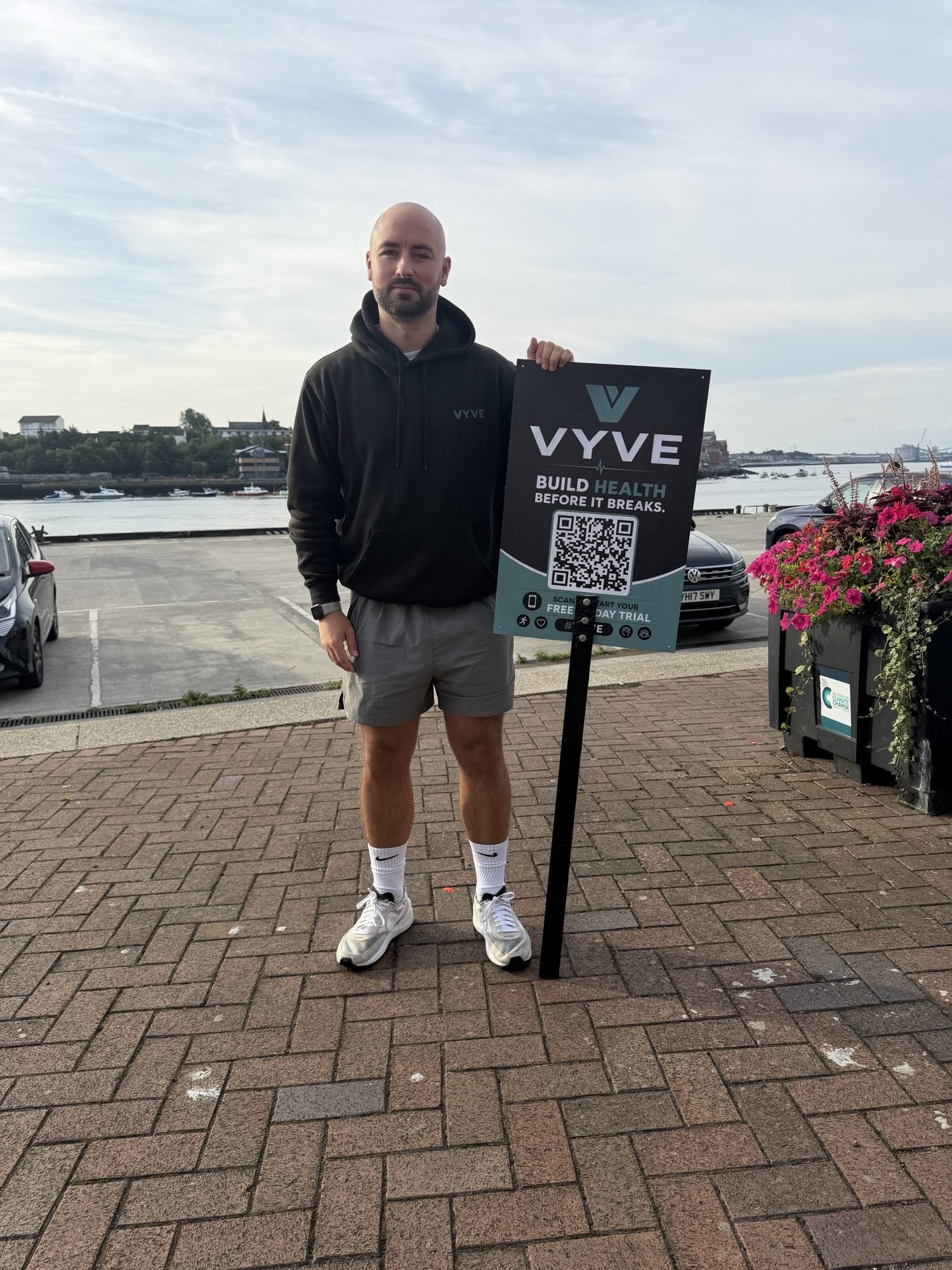 A man holding a sign.